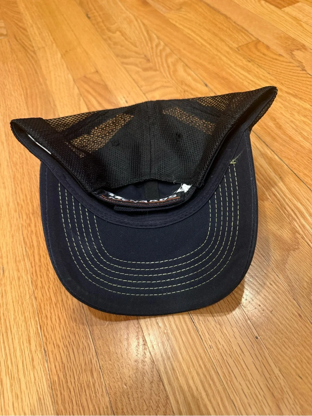 Menards Black Logo Trucker Hat with Yellow Stitching